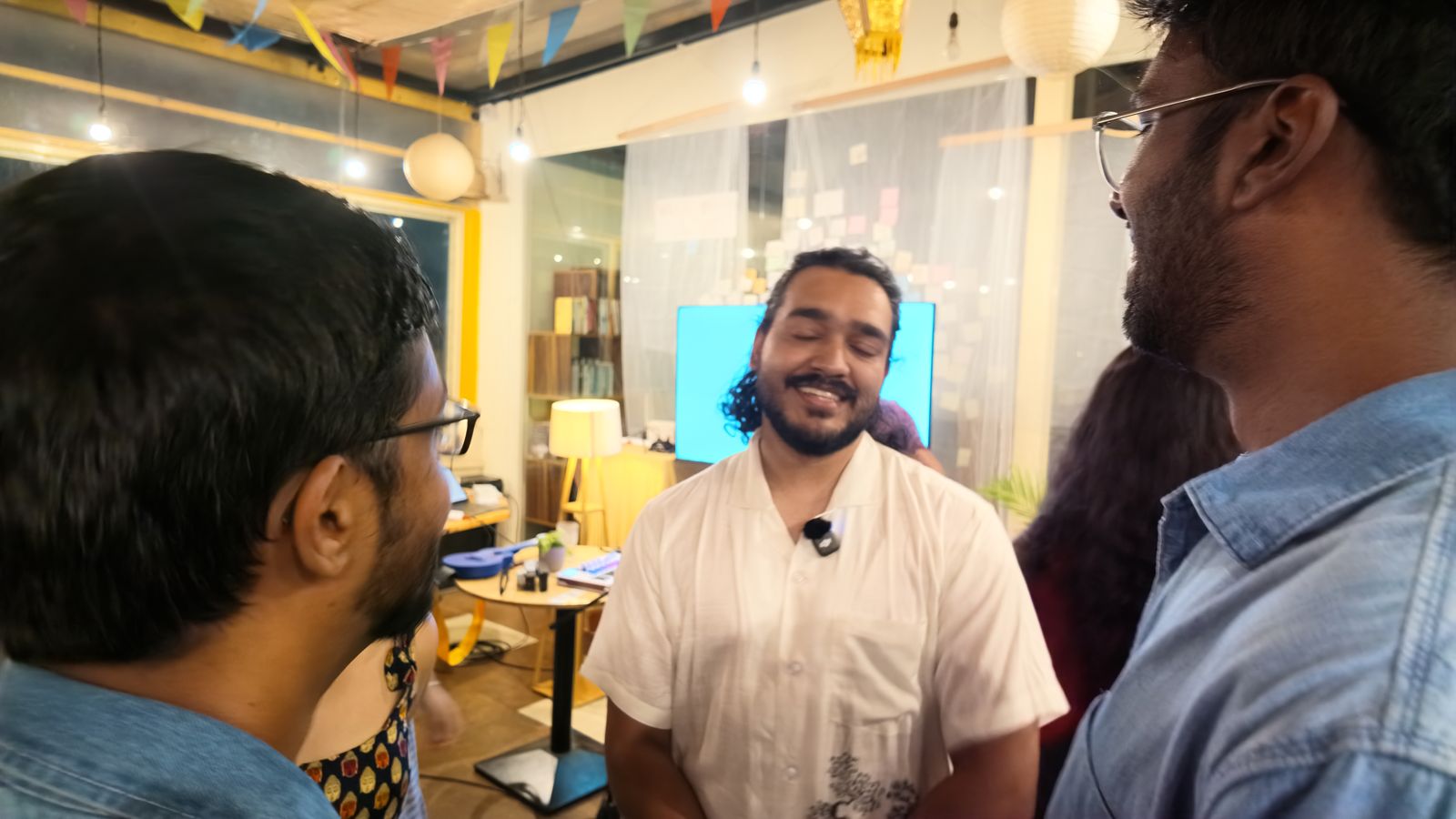 Nandan talking with guests before the show